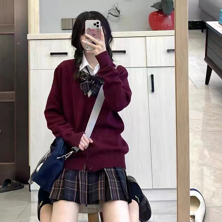 Kvinders college cardigan med klassisk krave og dekorativ sløjfedesign Stilla