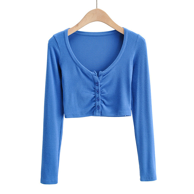 Dame cropped langærmet shirt med knapdetaljering og fin struktur Stilla