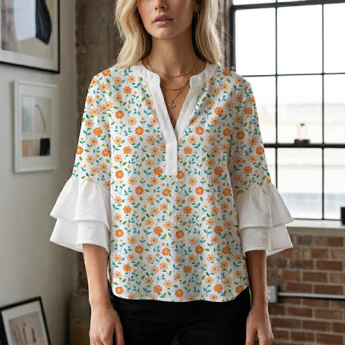 Dame bluse med voluminøse ærmer og kreativt trykdesign Skovae