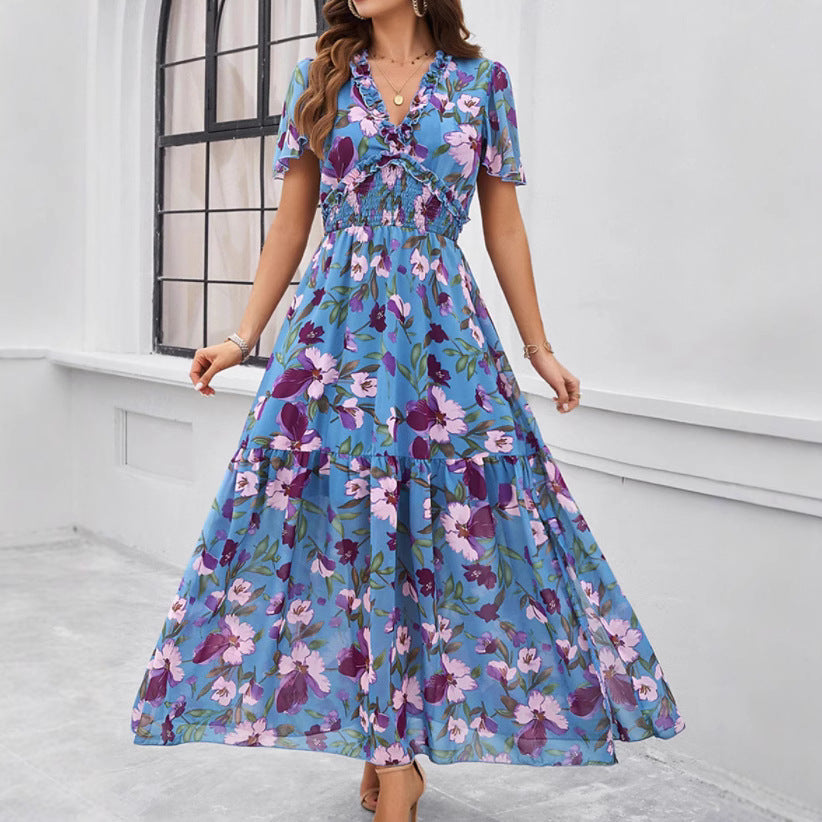 Dame maxikjole med blomsterprints og svungent snit Stilla