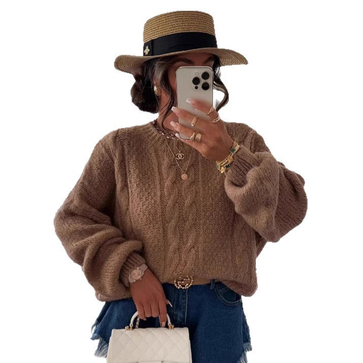 Kvinders chunky strik sweater med voluminøse ærmer og kabelmønster Stilla
