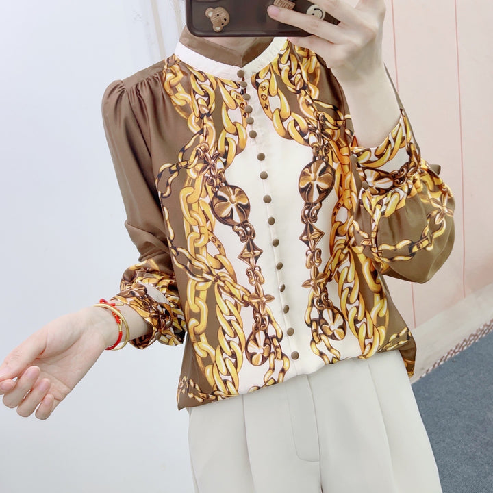 Dame chiffon-bluse med kunstnerisk kædemønster og elegante flæsedetaljer Stilla