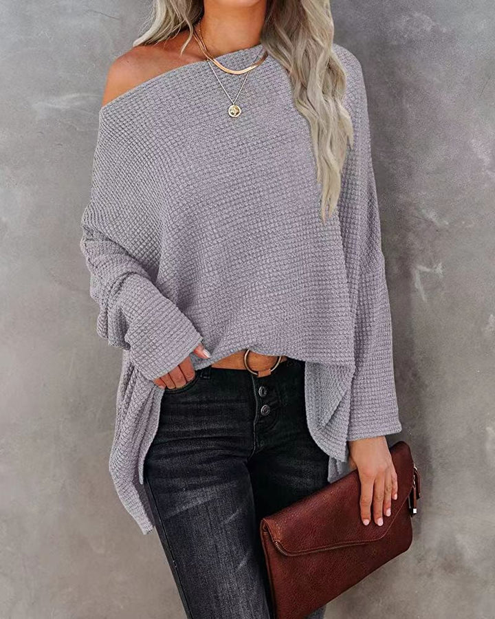 Dame Groft strikpullover med asymmetrisk kant og casual snit Stilla