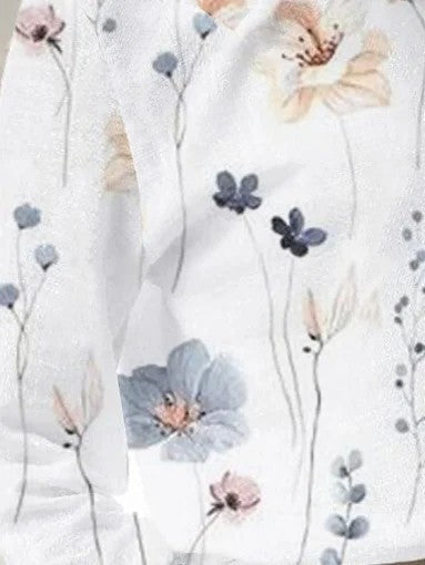 Damebluse med blomsterdesign og knapdetaljer Stilla