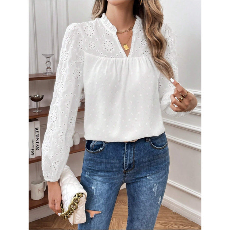 Dame elegant bluse med florale hulmønstre og pufærmer Stilla
