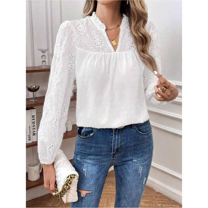 Dame elegant bluse med florale hulmønstre og pufærmer Stilla