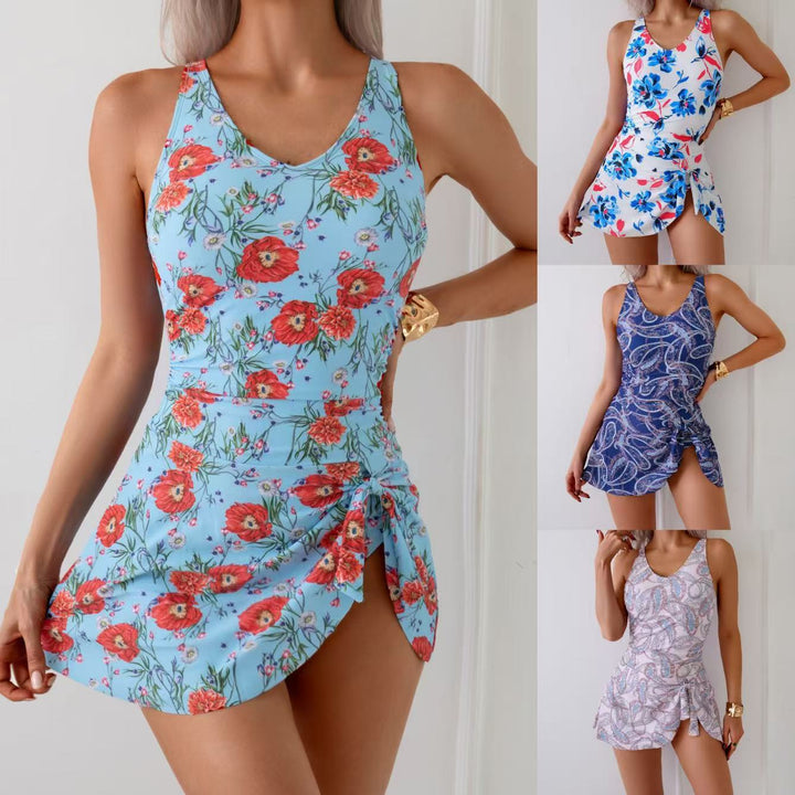 Dame badedragt med elegant, blomsterdesign og figurformende snit Stilla