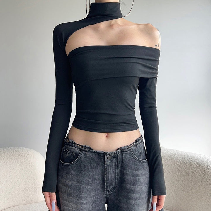 Dame mode top med asymmetrisk snit og elegant ruchesdetalje Skovae