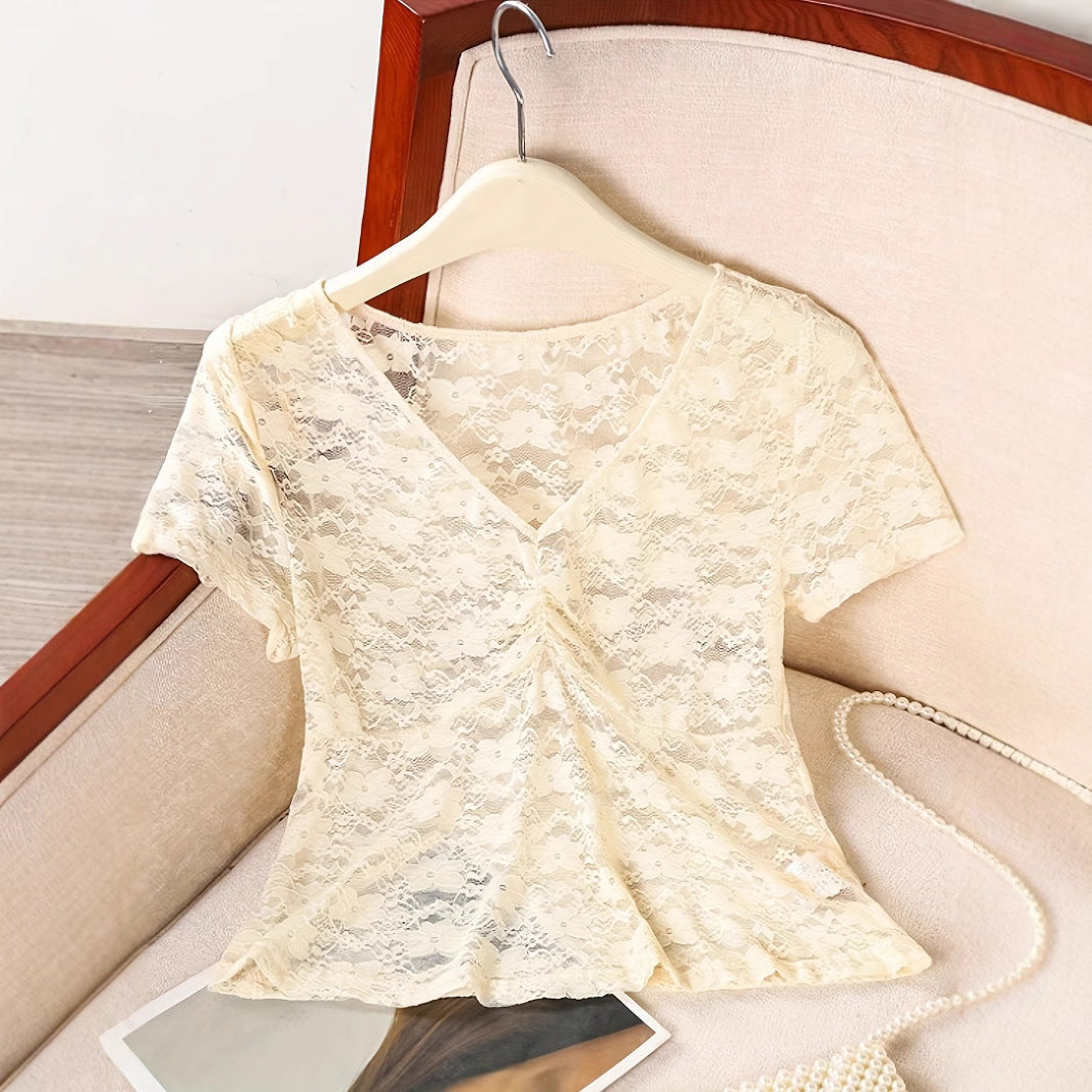 Dame spidsbluse med raffinerede detaljer og elegant snit Stilla