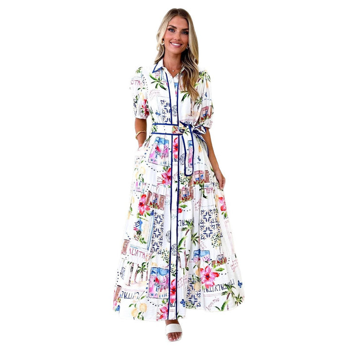 Dame maxikjole med farverig blomsterprint og et elegant bælte Stilla