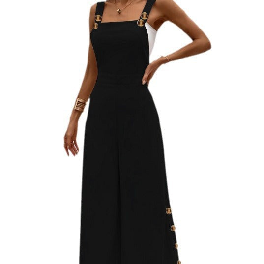Dame jumpsuit i elegant snit med dekorative knapdetaljer Stilla