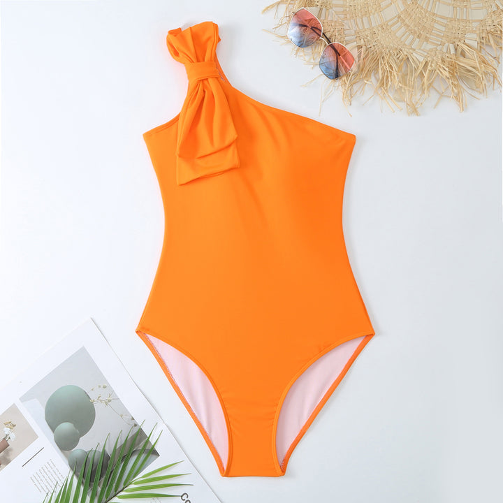 Dame bikini-sæt med asymmetrisk top og elegant indpakningsskørt Stilla