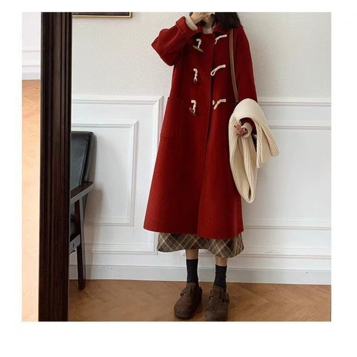Kvinders Duffle Coat med praktiske lommer og dekorative træ toggles.