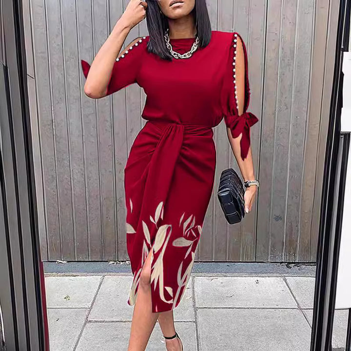 Elegant midi-kjole til kvinder med stilfulde cut-out-ærmer Stilla