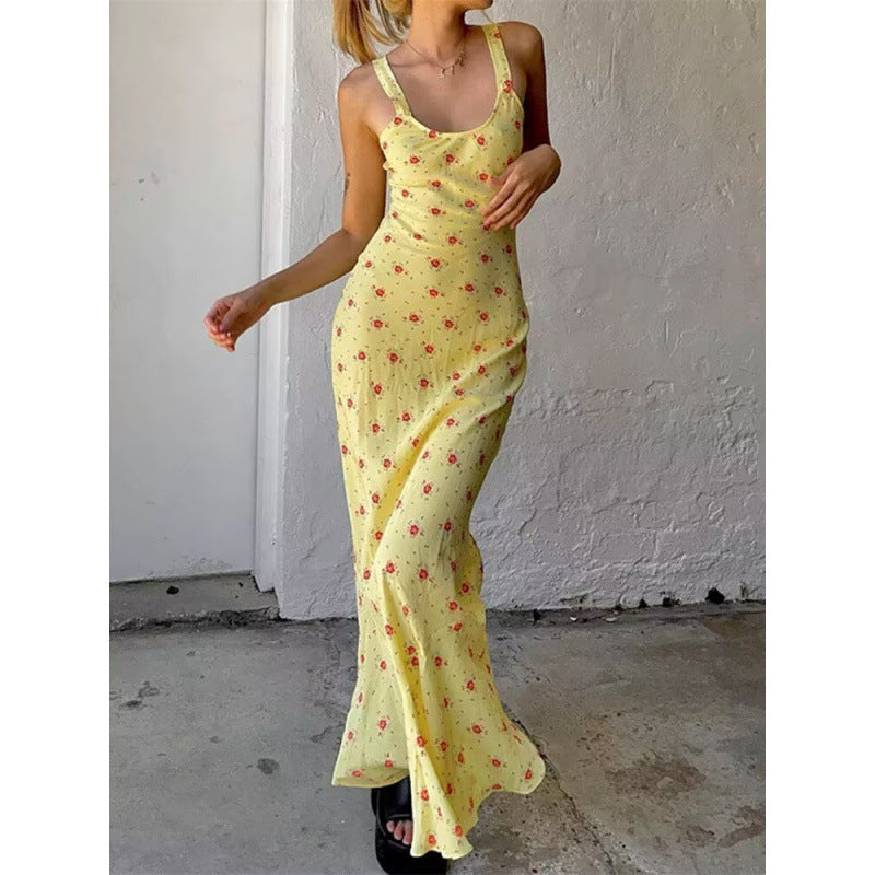 Dame maxikjole med blomstret design og elegant silhuet Skovae