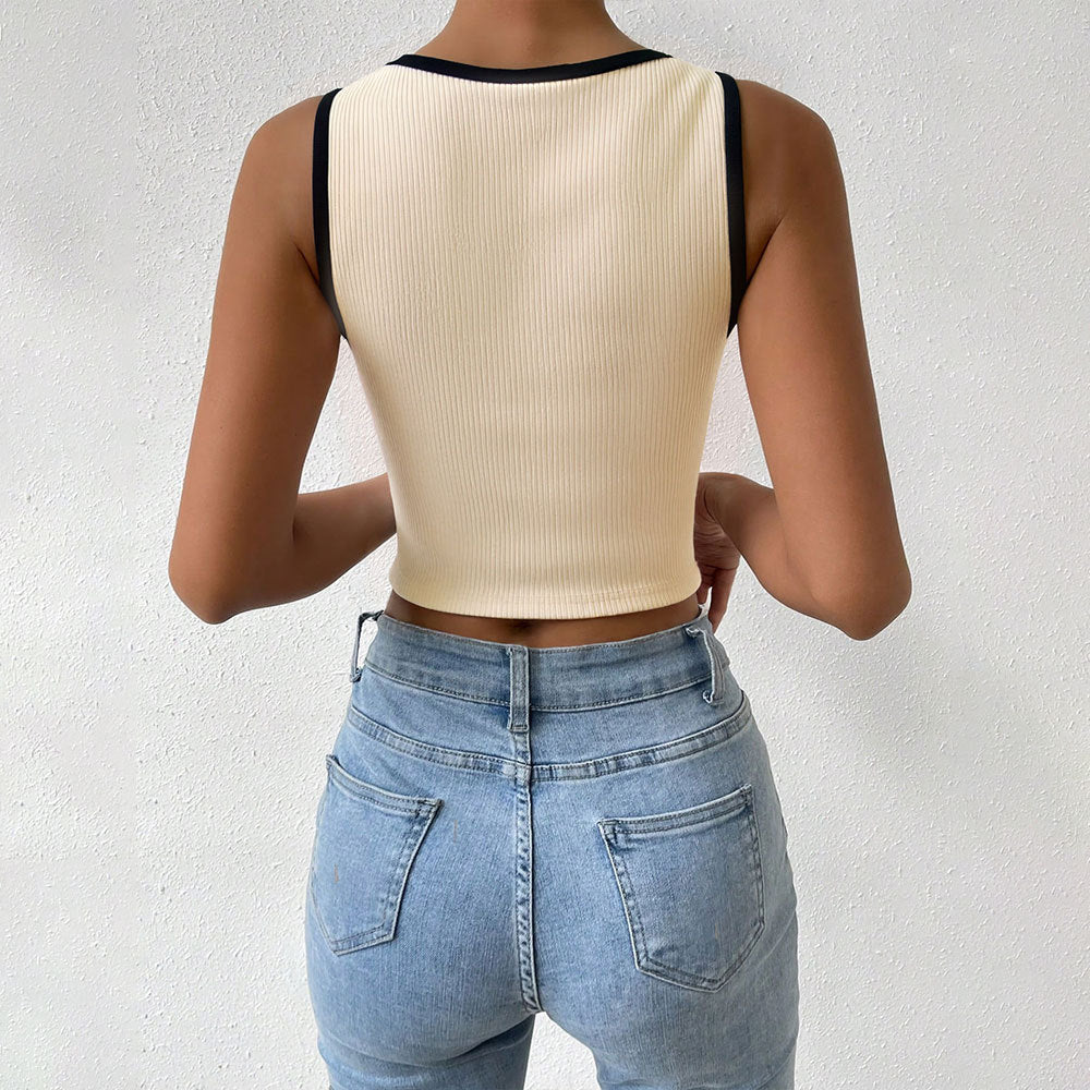 Kvinders cropped top med elegant ribbet design og kontrastkrave Stilla