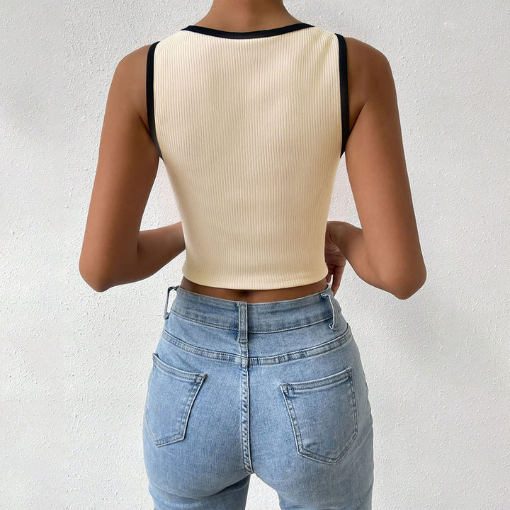 Kvinders cropped top med elegant ribbet design og kontrastkrave Stilla