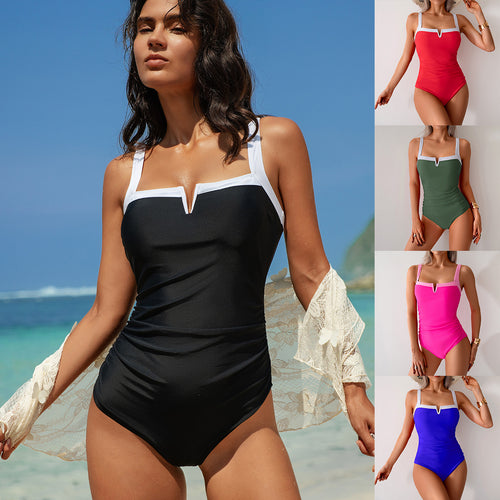 Dame one-piece badetøj med elegant rynkning og moderne V-udskæring Stilla