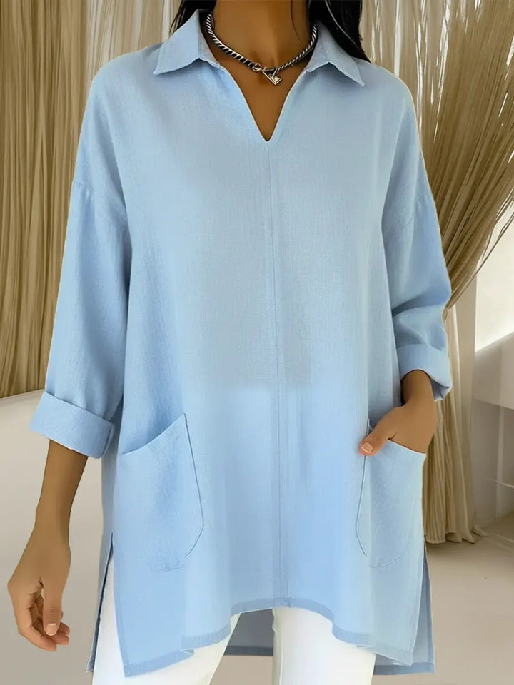 Dame Langærmet bluse med elegant V-hals og praktiske lommer Skovae