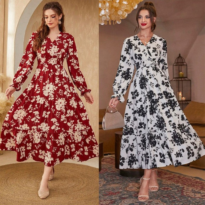 Dame maxikjole med blomsteret voluminøst skørt og elegant V-hals Stilla