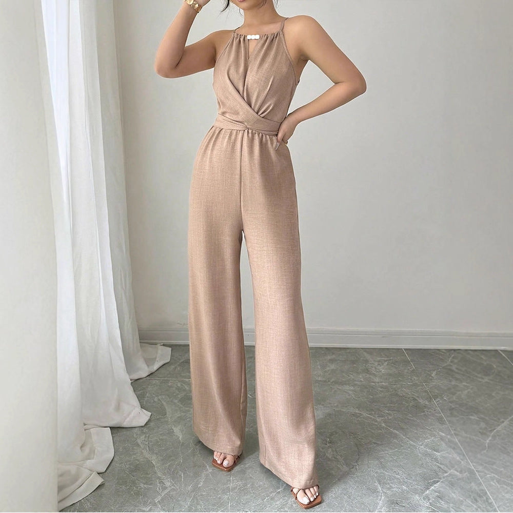 Dame gulvlængde jumpsuit med raffineret indpakningsdesign og elegant taljesøm Skovae