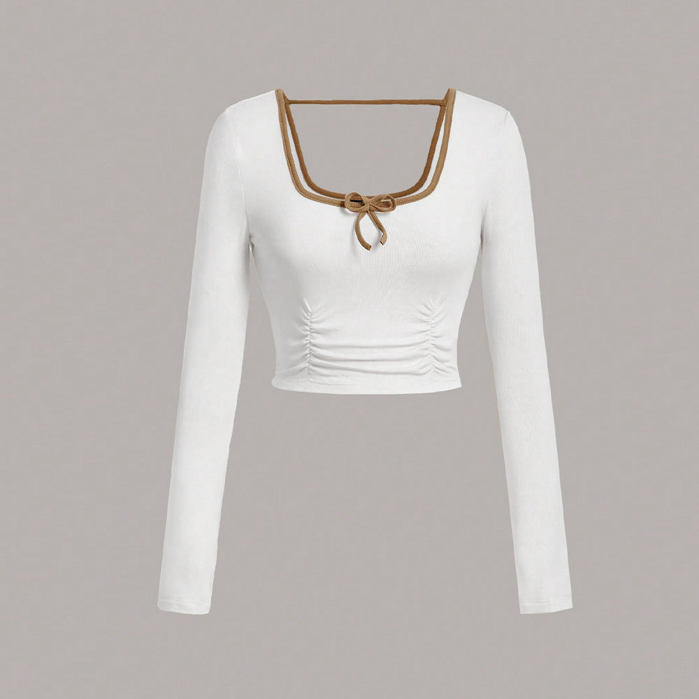 Dame cropped langærmet top med stilfuld firkantet halsudskæring og sofistikerede knudedetaljer Stilla