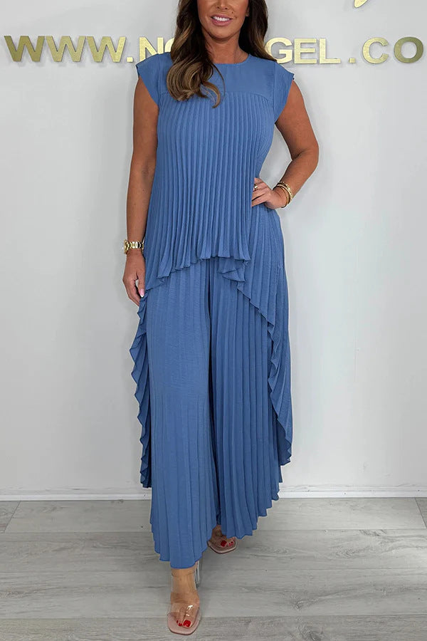 Dame Plisseret Jumpsuit med flydende snit og asymmetrisk design Stilla