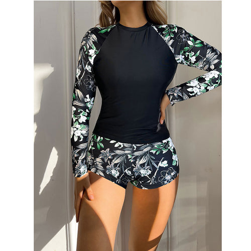 Dame Sporty Longsleeve Swimsuit med blomsterdesign Stilla