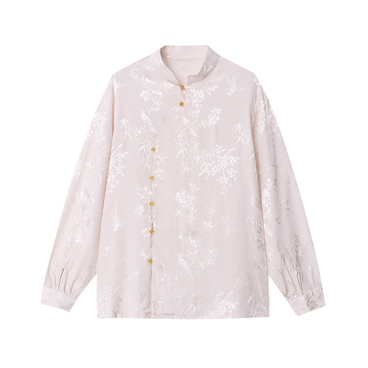 Damebluse med blomsterbroderi og fine knapdetaljer Stilla