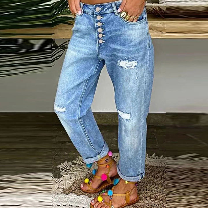 Dame Mom Jeans med knaplukning og stilfulde slidte detaljer