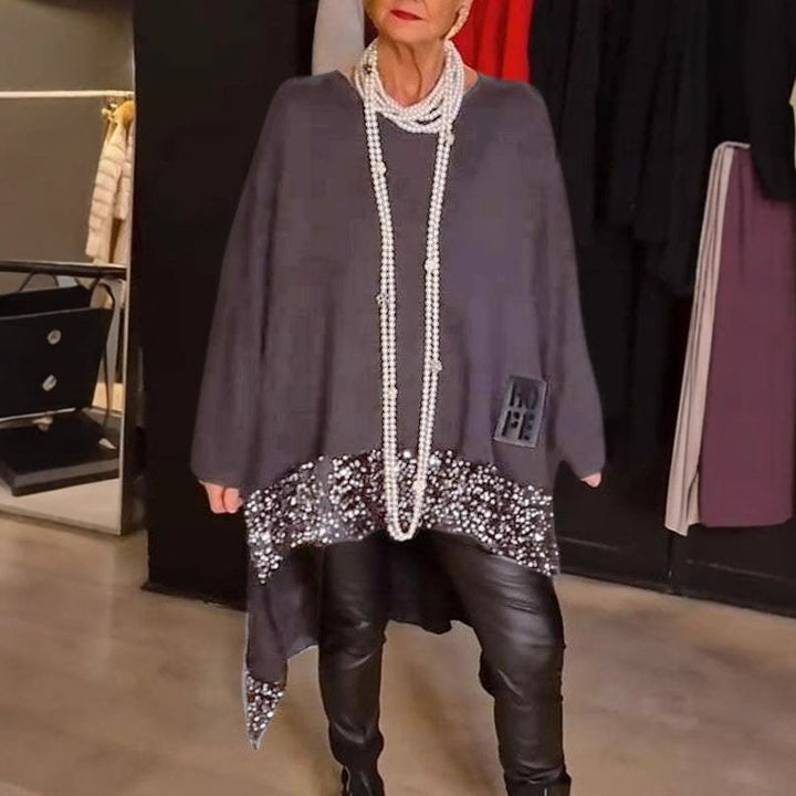 Dame Oversized Pullover med glimmerdetaljer Stilla