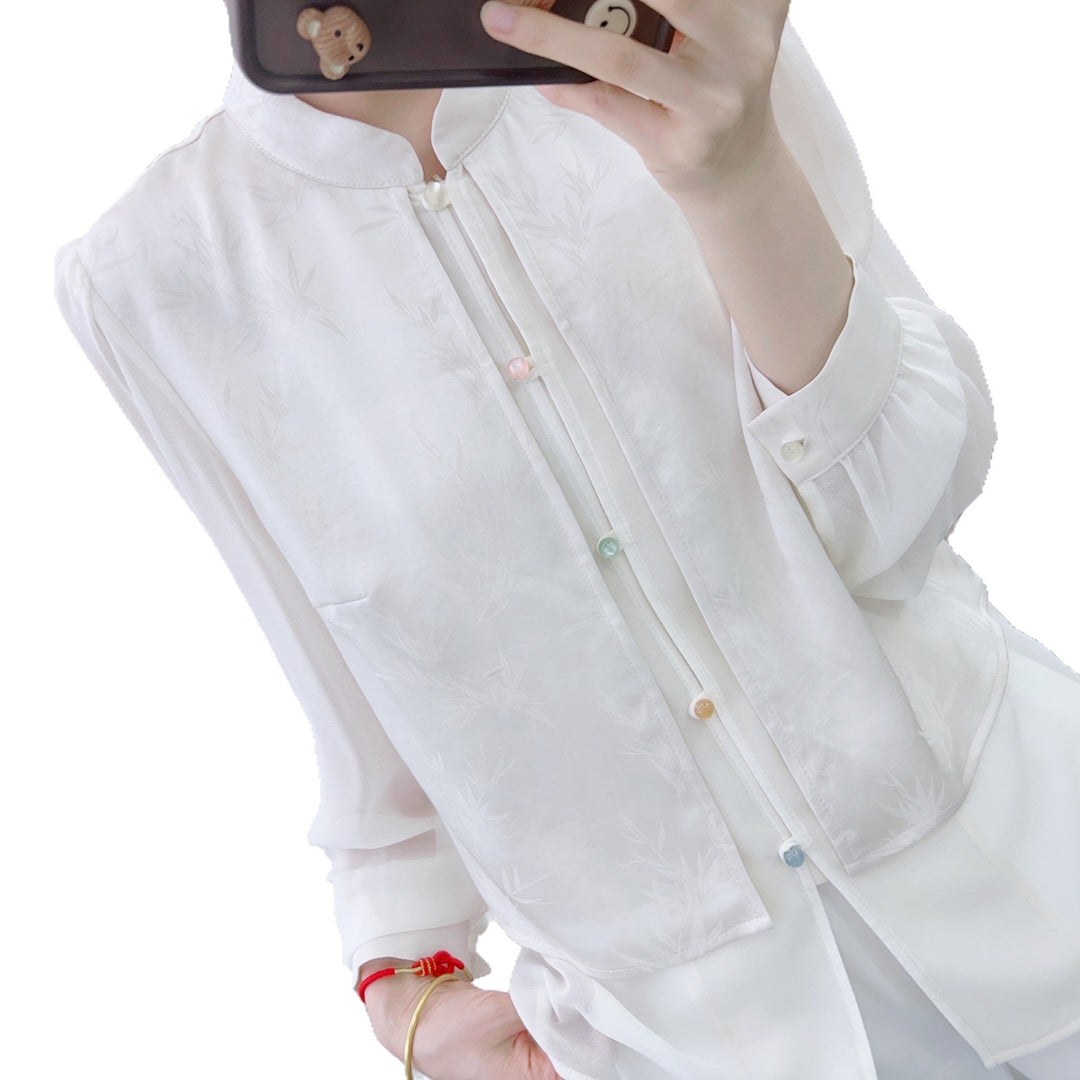 Damebluse med blomsterdesign og elegant krave Stilla
