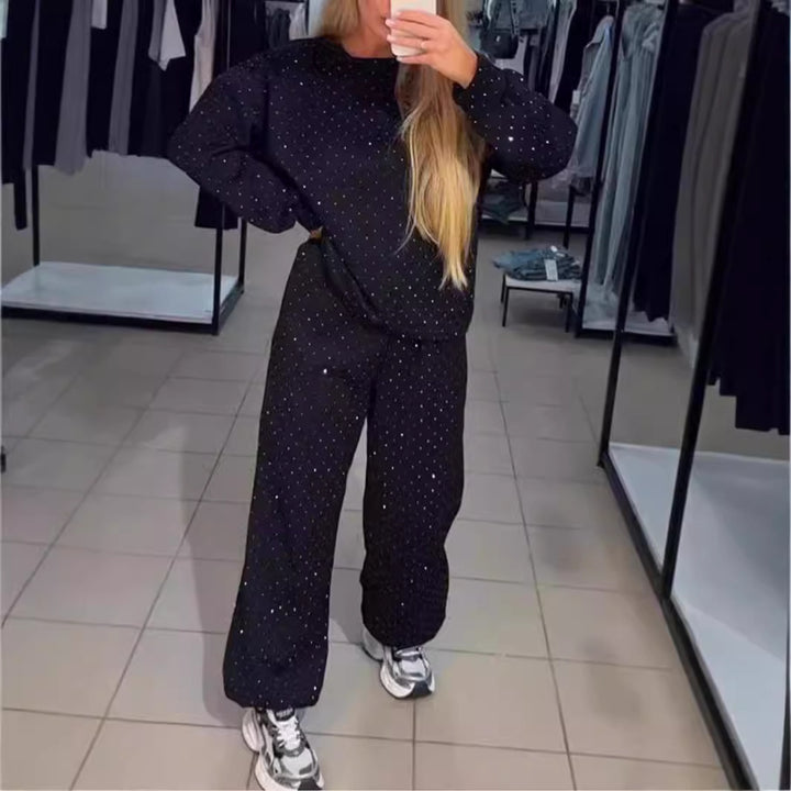 Kvinders sporty lounge sæt med glitrende detaljer og løs pasform Stilla