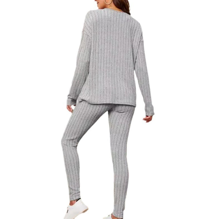 Dame hyggelig strikdragt med elegante striber Stilla