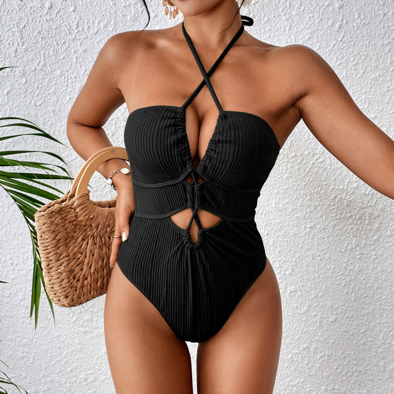 Dame one-piece badedragt med cut-out og raffinerede knude-detaljer Stilla