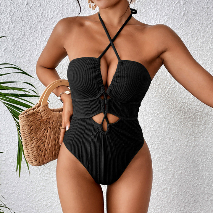 Dame one-piece badedragt med cut-out og raffinerede knude-detaljer Stilla
