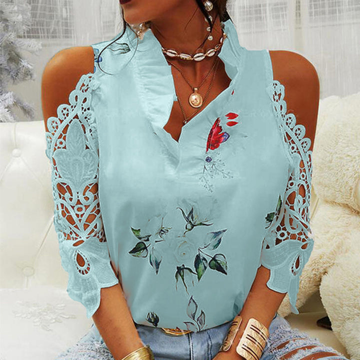 Damebluse med cut-out-ærmer og spetsdetaljer Stilla