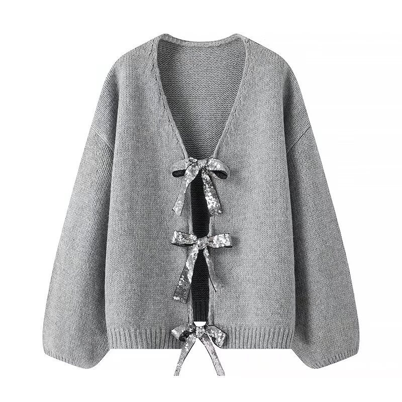 Kvindernes løse strikket cardigan med elegante bånddetaljer Stilla