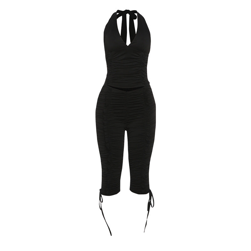 Dame jumpsuit med raffinerede rynkeelementer og stilfulde bånd Skovae