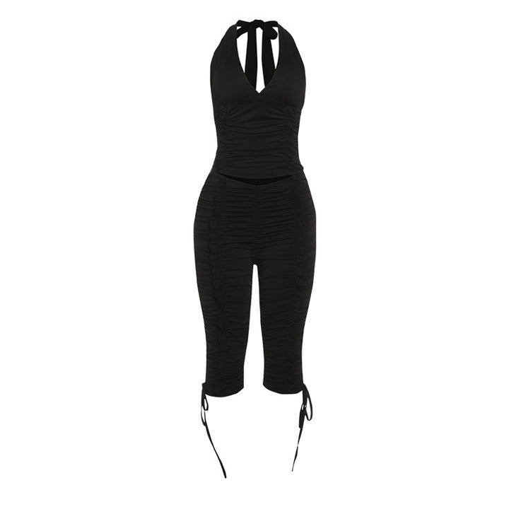 Dame jumpsuit med raffinerede rynkeelementer og stilfulde bånd Skovae
