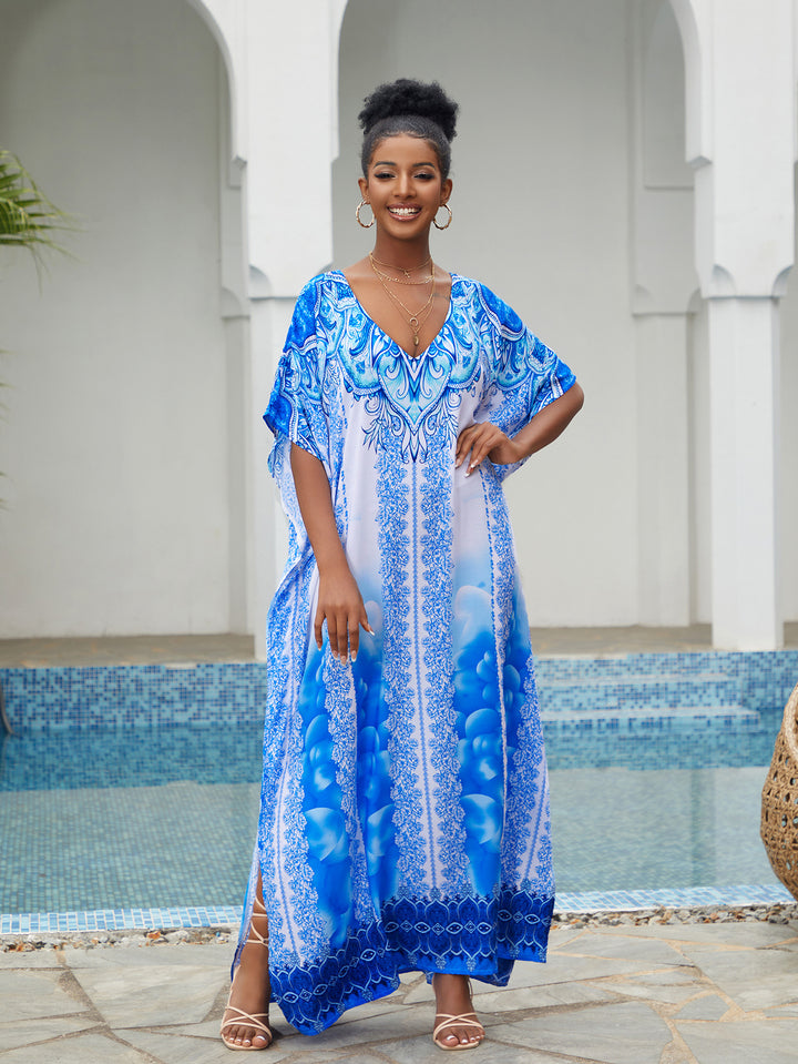 Dame lang kaftan med elegant blomsterdesign og sidelommer Stilla