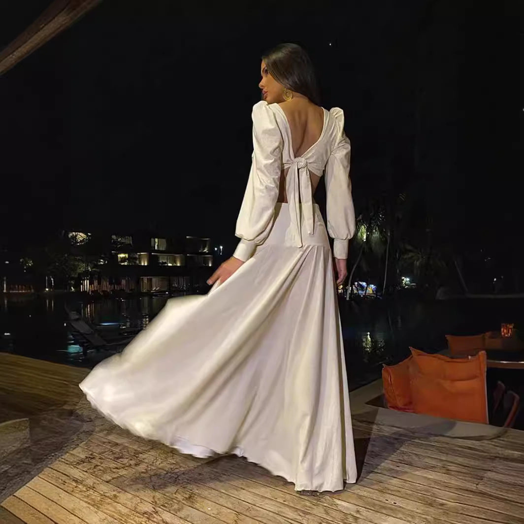 Dame maxikjole med elegant cut-out-design og dyb v-udskæring Stilla