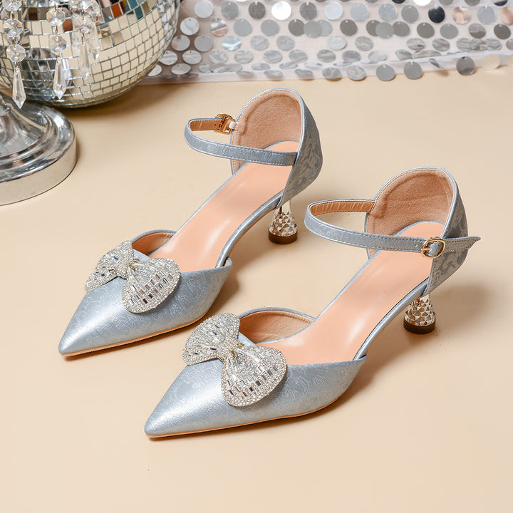 Dame elegante pumps med glimmerdetaljer og dekorativ sløjfe Stilla