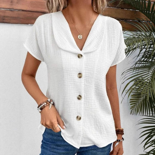 Damebluse med elegant klapkrave og dekorative knapper Stilla