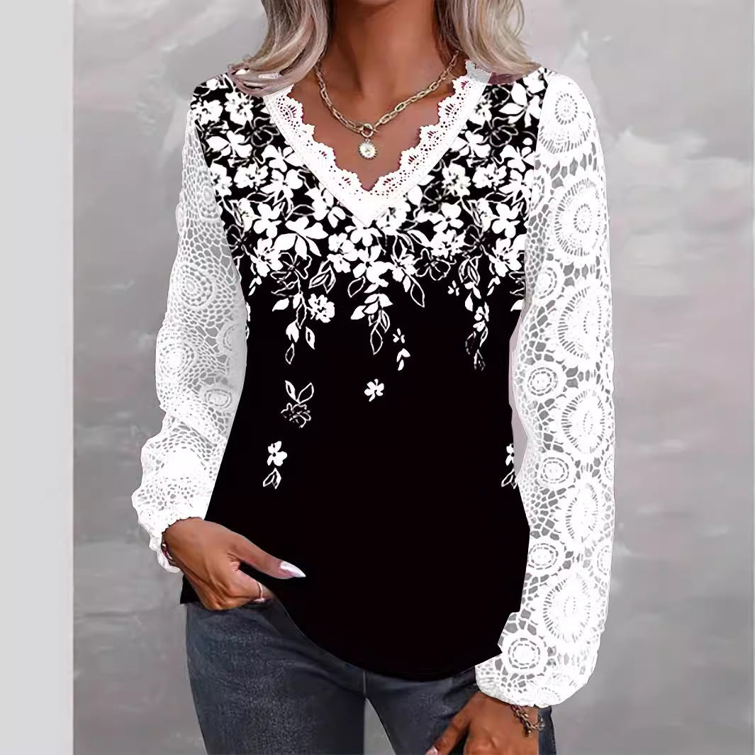 Damebluse med florale accenter og romantiske spidsærmer Stilla