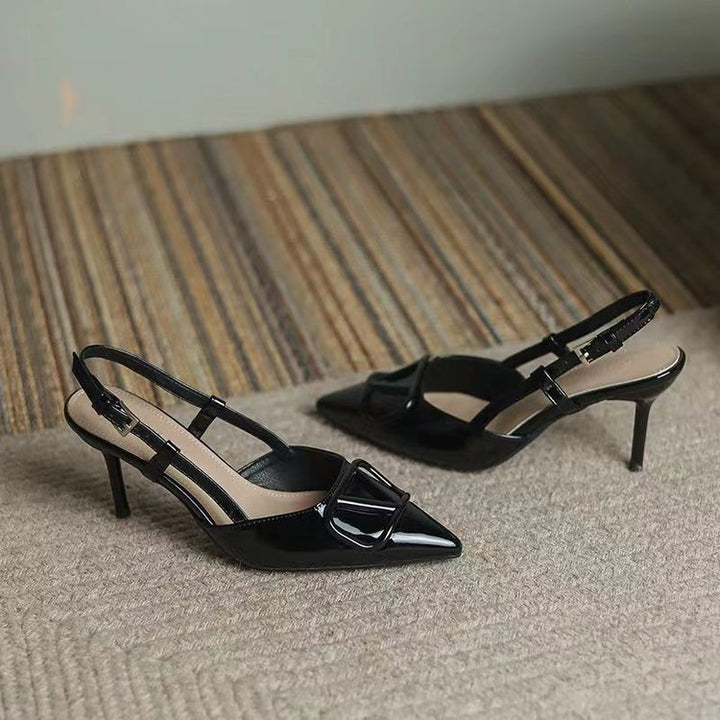 Dame Sling-Pumps med elegant spids form og justerbar rem Stilla