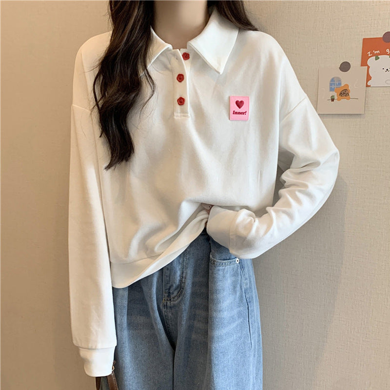 Femme Relaxed Fit Polo-Style Sweatshirt med Hjerteemblem Stilla