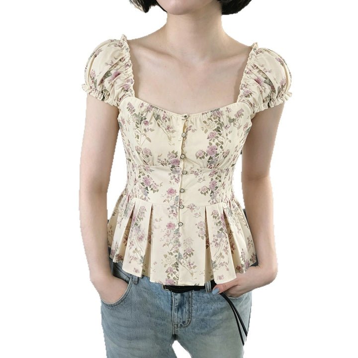 Damebluse med blomsterdesign og flæseærmer Skovae