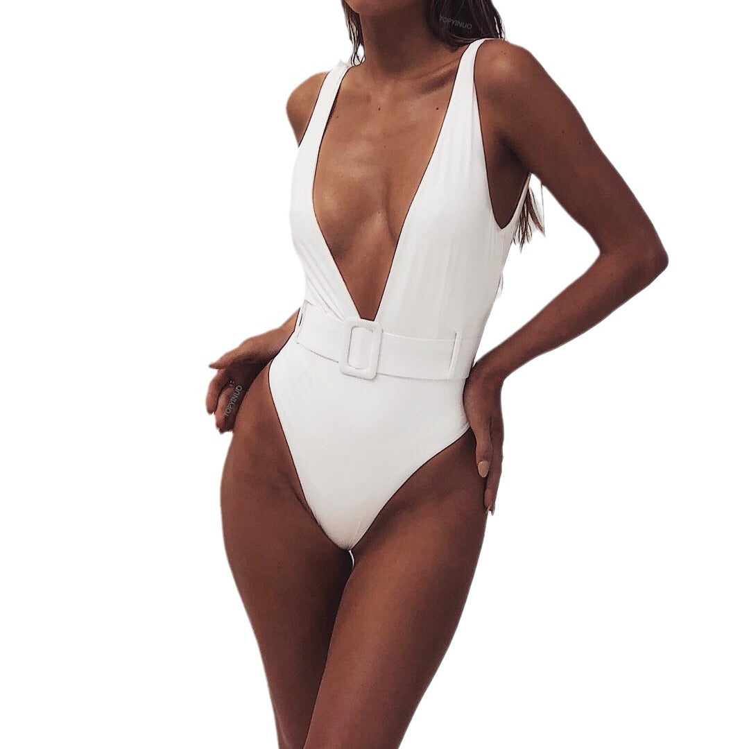 Dame one-piece badedragt med dyb V-udskæring og fashionabelt bælte Stilla