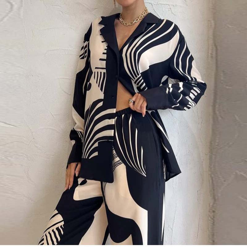 Dame To-delt Strandoutfit med moderne grafisk design Stilla